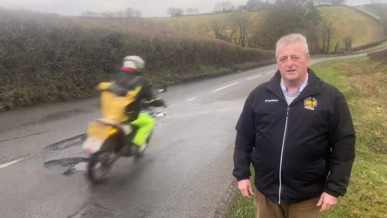 “Absolutely scary” moment captured as motorcyclist inches from pothole peril