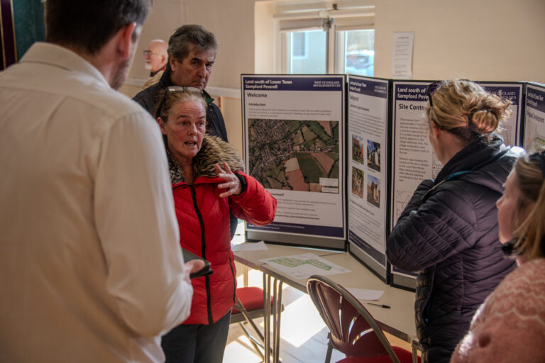 New housing bid for village ignites debate over roads and green land
