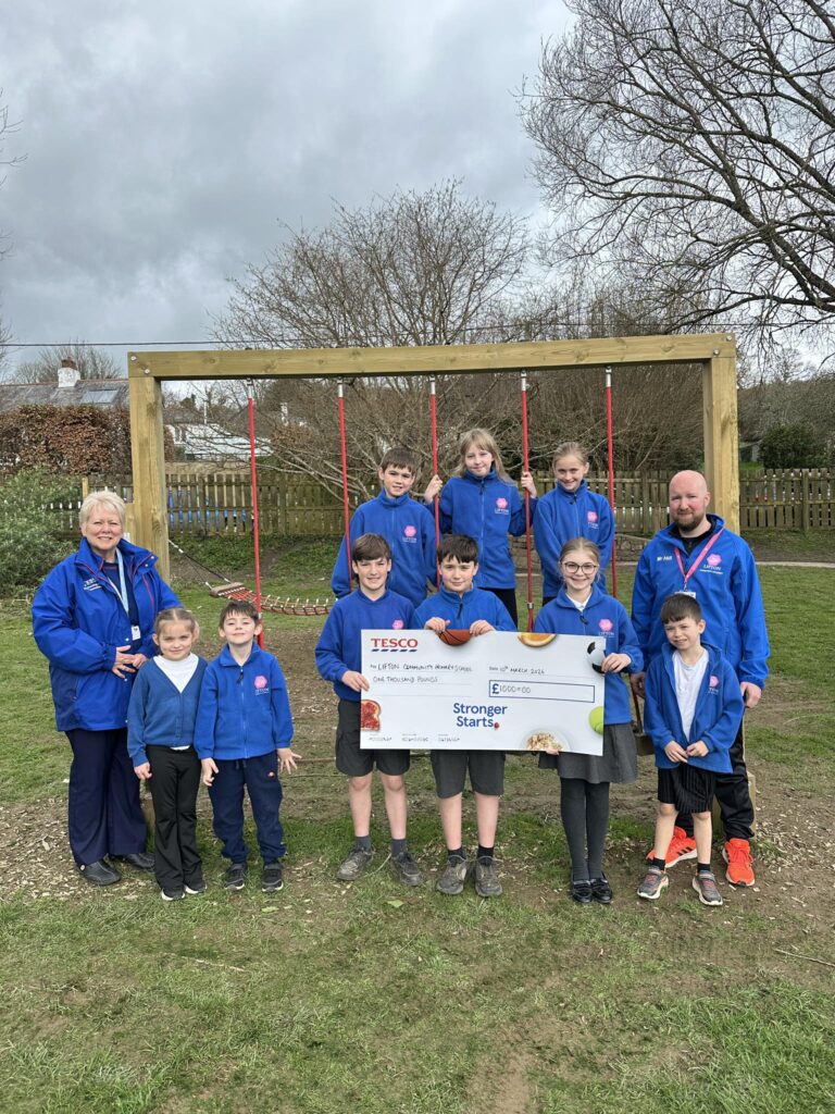 Lifton pupils wheel away with £1,000 Tesco boost for playground fun