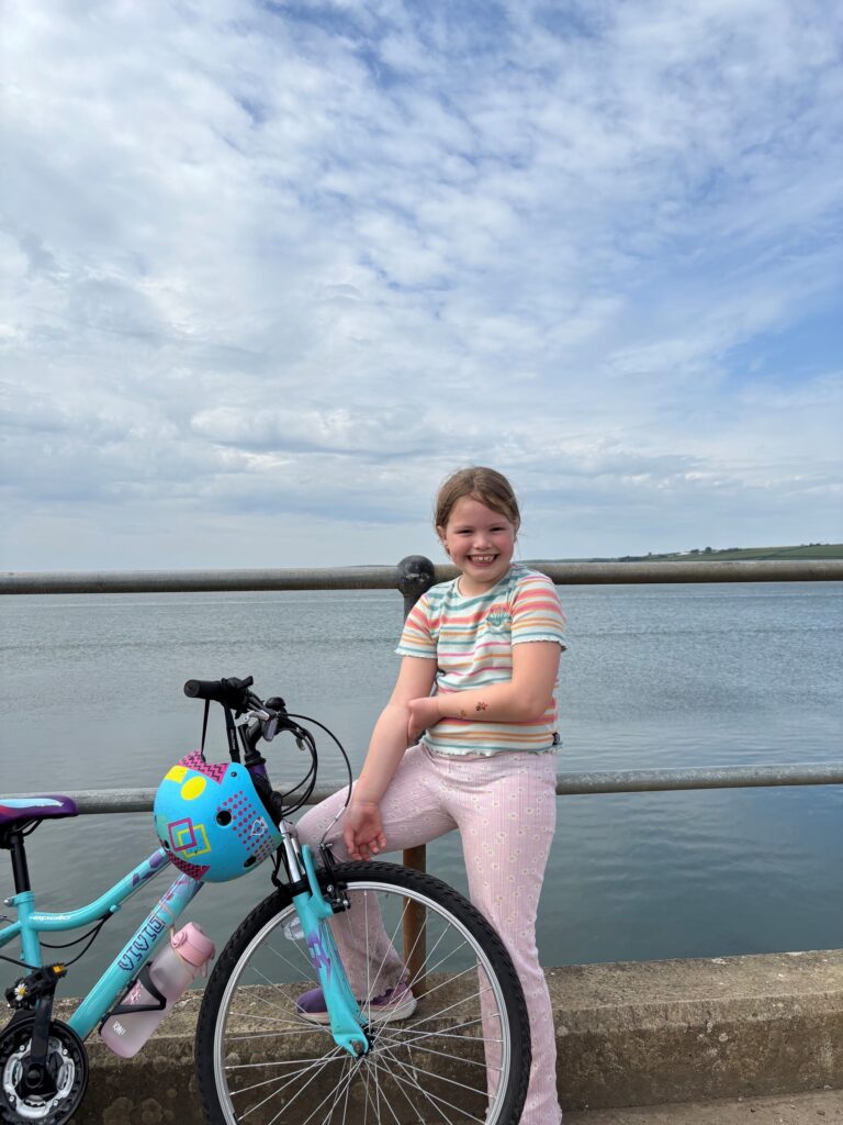 Seven-year-old cycles marathon distance to help sick children