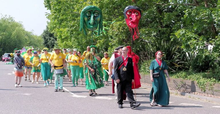 Crowds flock to Pilton as Green Man Day fills streets with music and colour